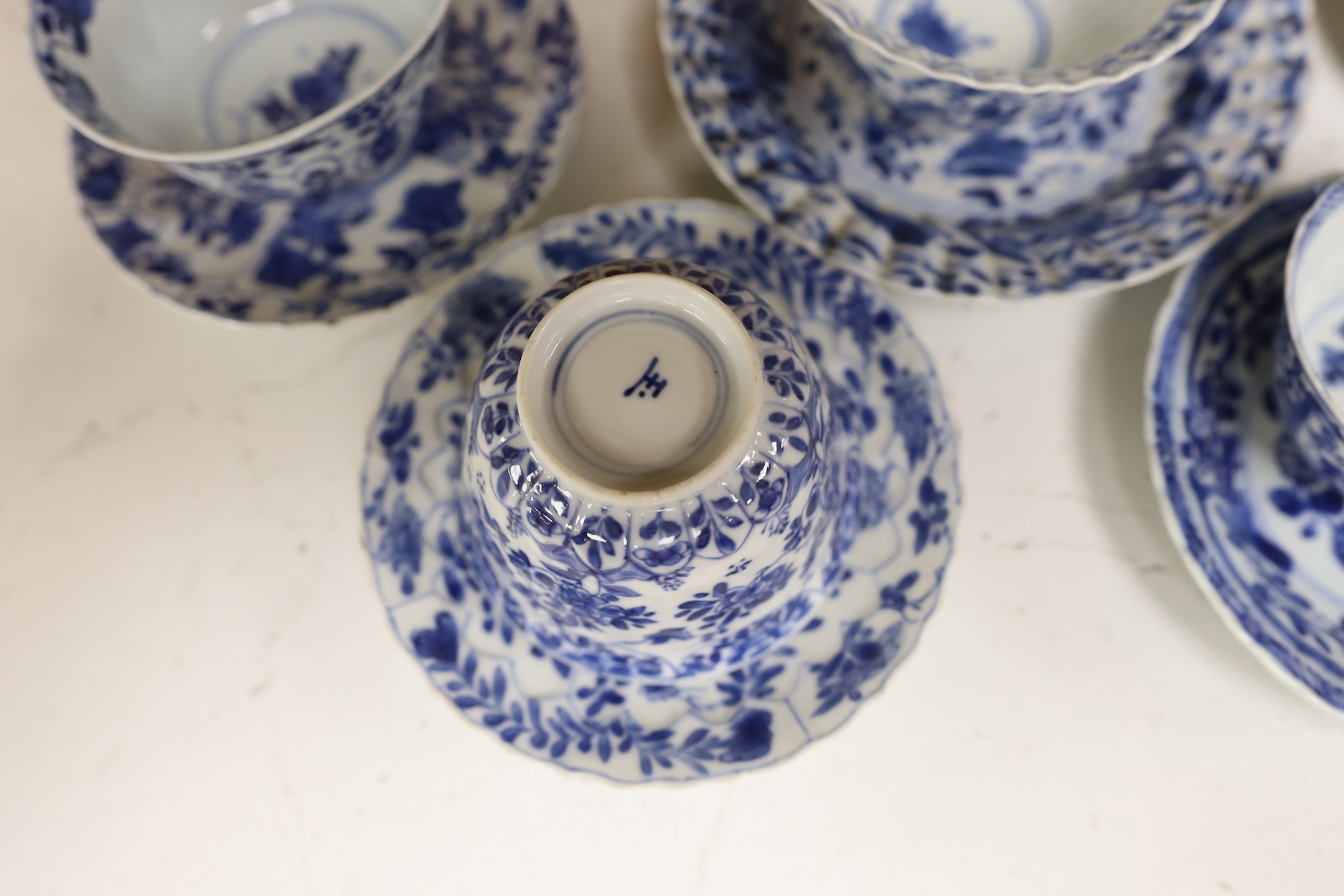 A group of seven Chinese blue and white tea bowls and five saucers, 18th-century
